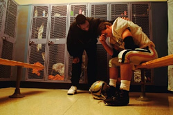 a football player trying to handle defeat