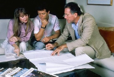 Couple people counting the costs of a project or vacaton