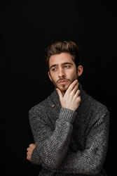 man thoughtful, hand on chin