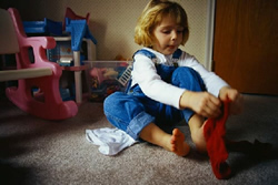 little girl dressing for church